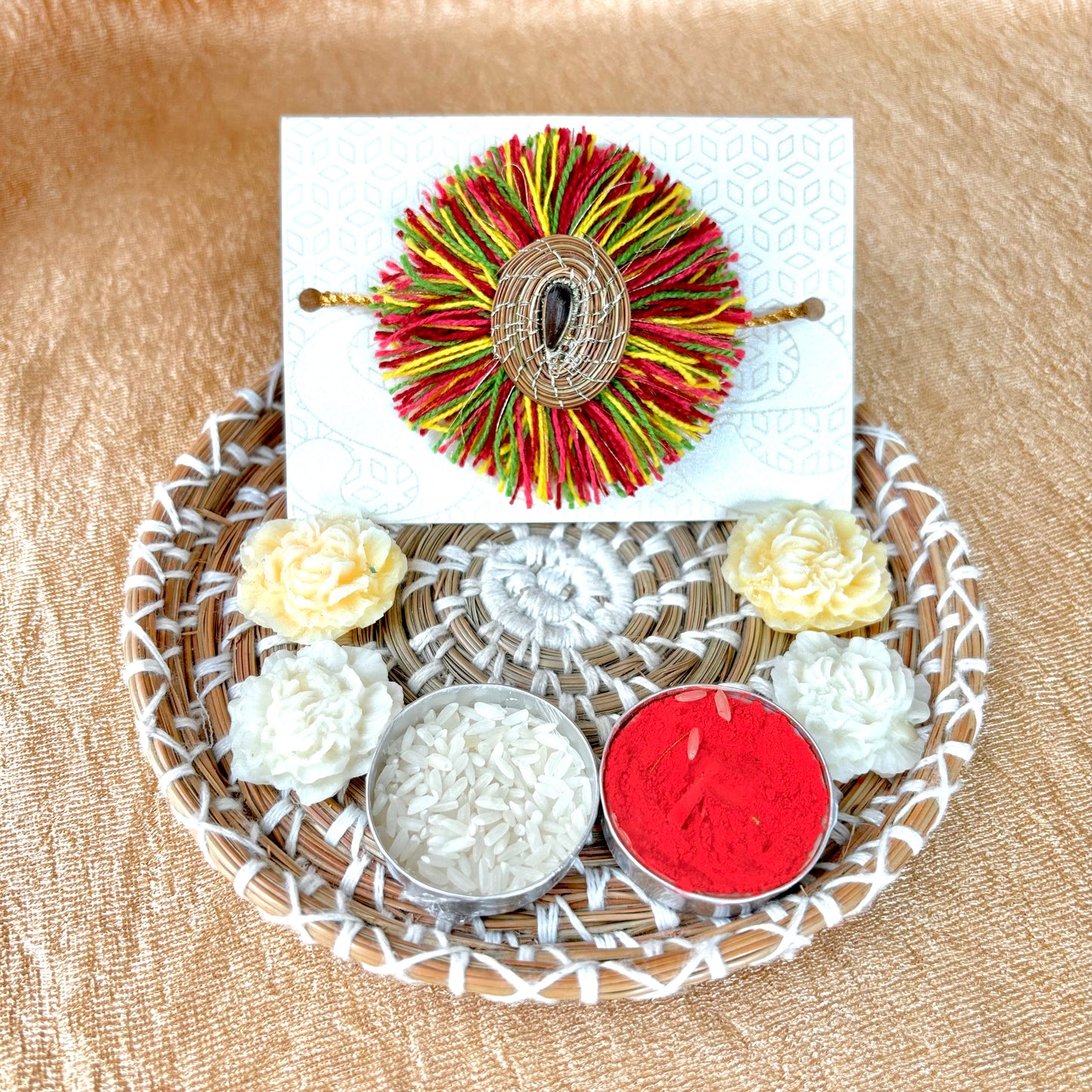 SOE Plantable Pine Needle Rakhi: AMBOLI with sunflower seed (with rice & tikka)