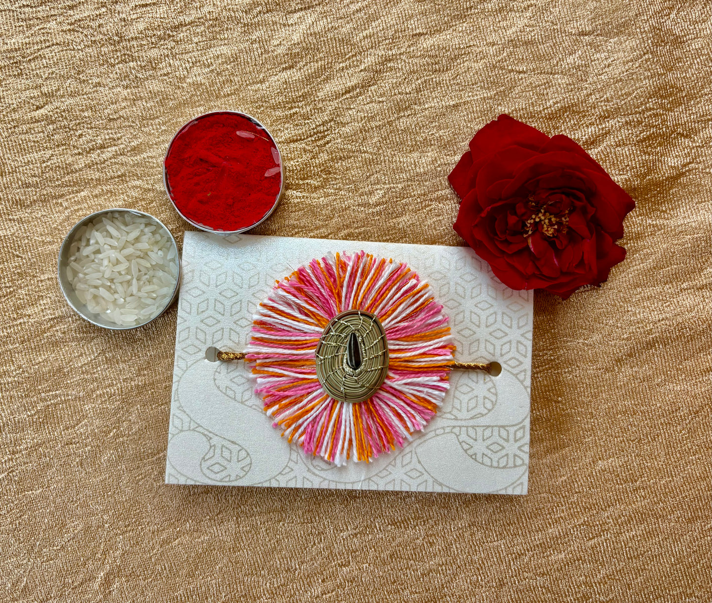 SOE Plantable Pine Needle Rakhi: GULNAR with sunflower seed (with rice & tikka)