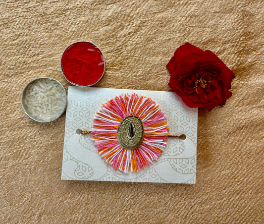 SOE Plantable Pine Needle Rakhi: GULNAR with sunflower seed (with rice & tikka)