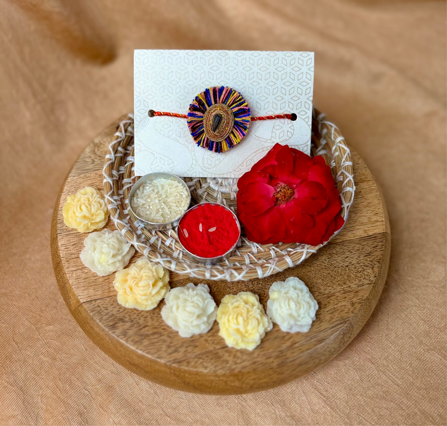 SOE Plantable Pine Needle Rakhi: KUMUD with sunflower seed (with rice & tikka)