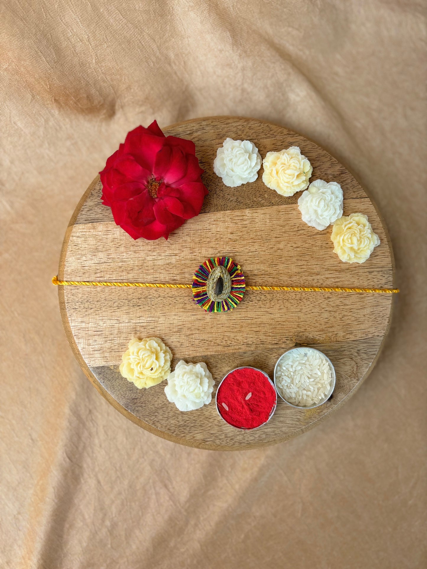 SOE Plantable Pine Needle Rakhi: GULKHARI with sunflower seed (with rice & tikka)