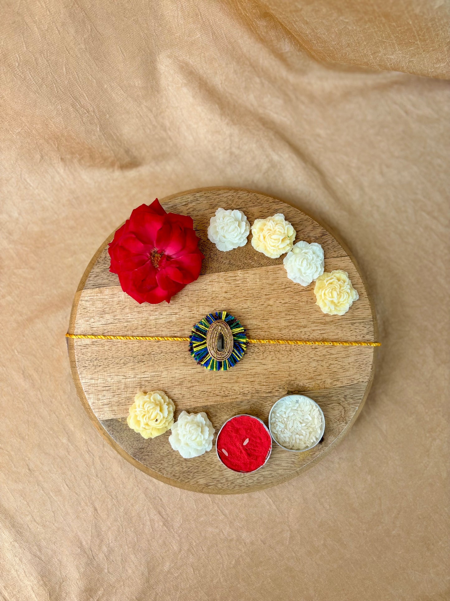 SOE Plantable Pine Needle Rakhi: APARAJITA with sunflower seed (with rice & tikka)