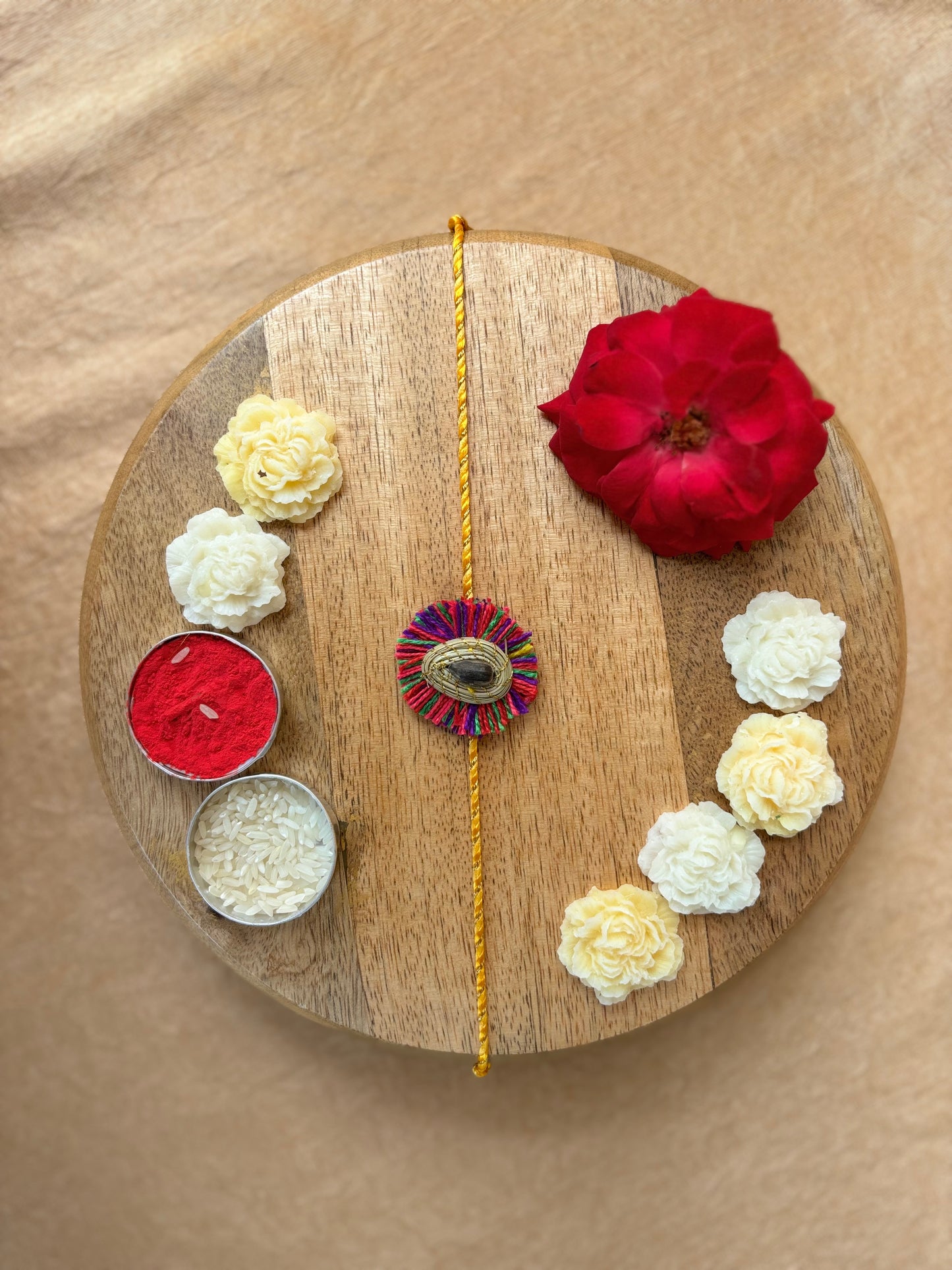 SOE Plantable Pine Needle Rakhi: MALTI with sunflower seed (with rice & tikka)