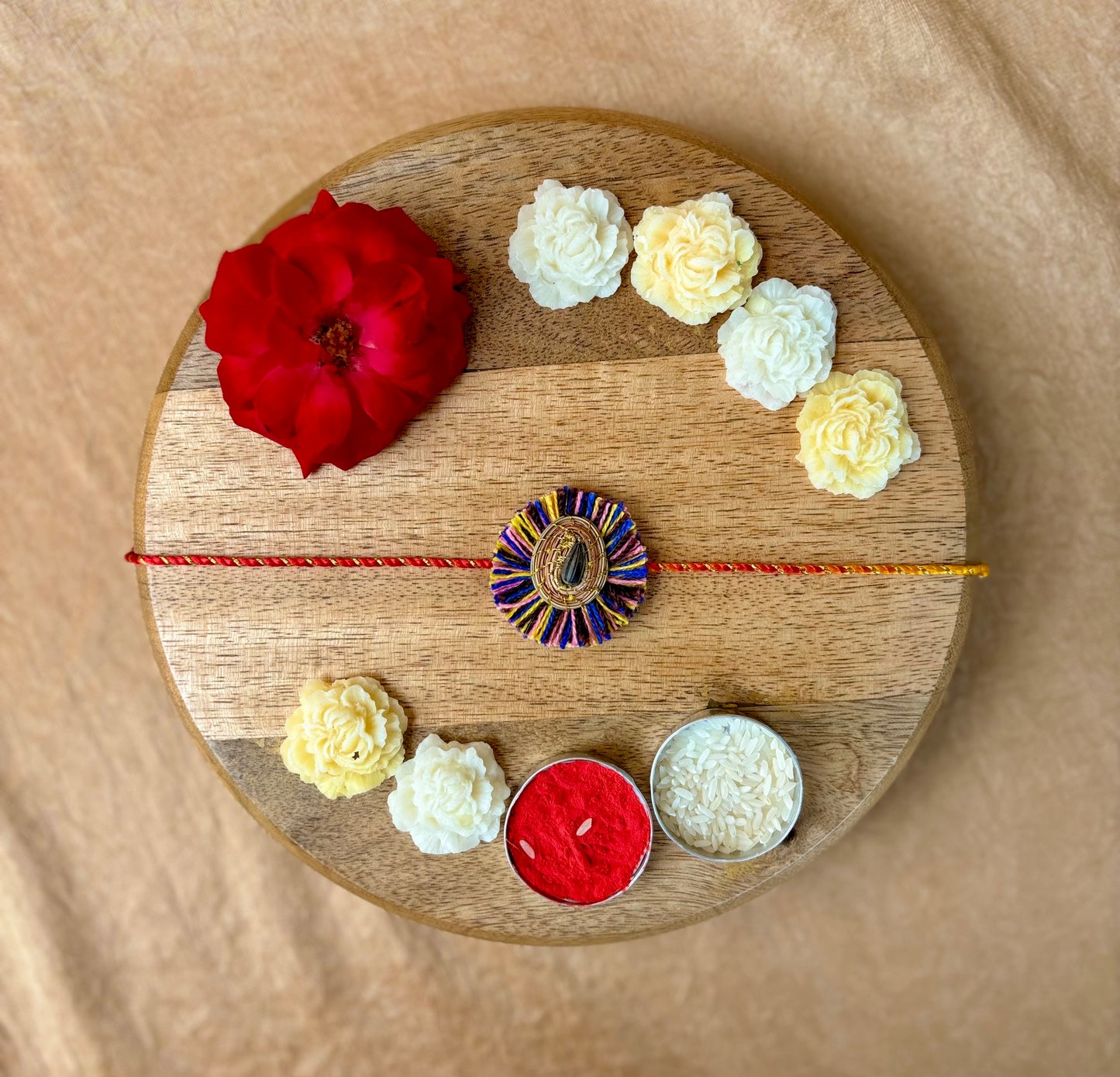 SOE Plantable Pine Needle Rakhi: KUMUD with sunflower seed (with rice & tikka)