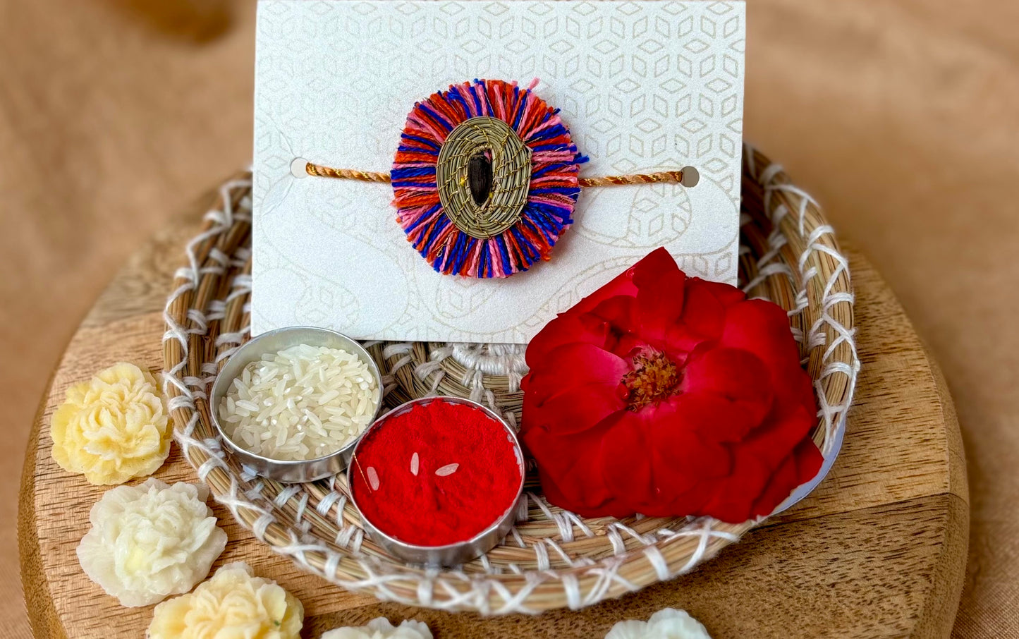 SOE Plantable Pine Needle Rakhi: KESAR with sunflower seed (with rice & tikka)