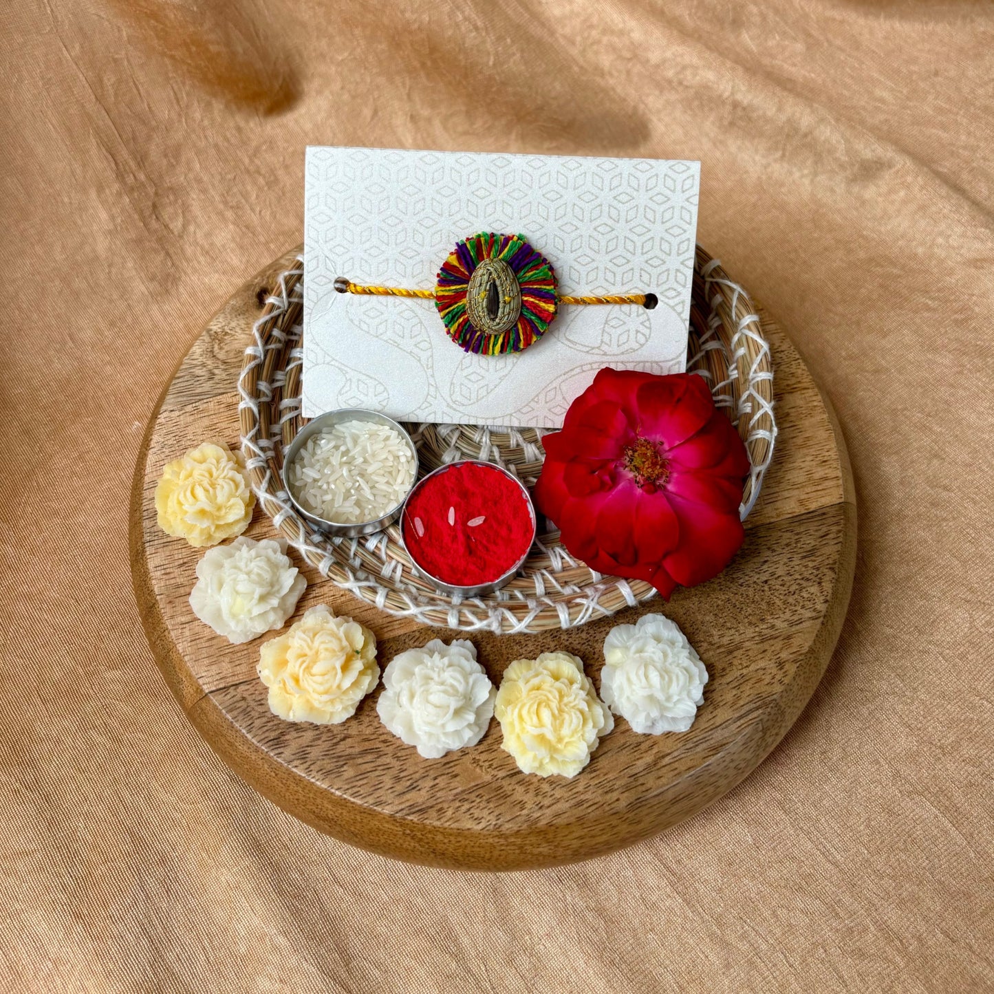 SOE Plantable Pine Needle Rakhi: GULKHARI with sunflower seed (with rice & tikka)