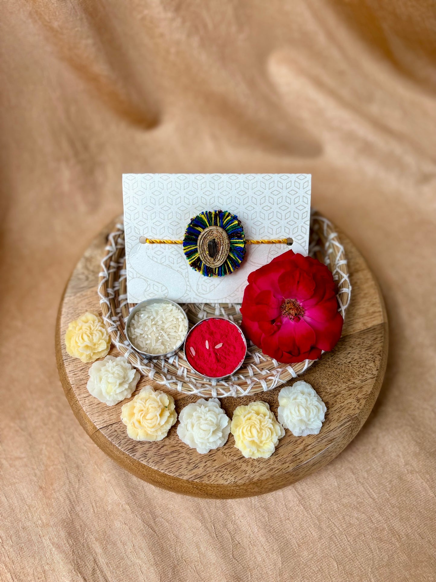 SOE Plantable Pine Needle Rakhi: APARAJITA with sunflower seed (with rice & tikka)