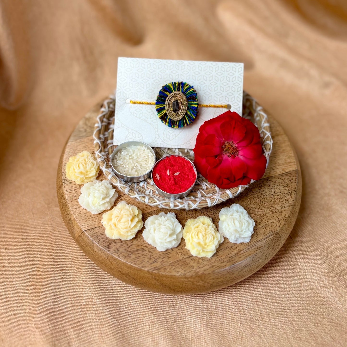 SOE Plantable Pine Needle Rakhi: APARAJITA with sunflower seed (with rice & tikka)